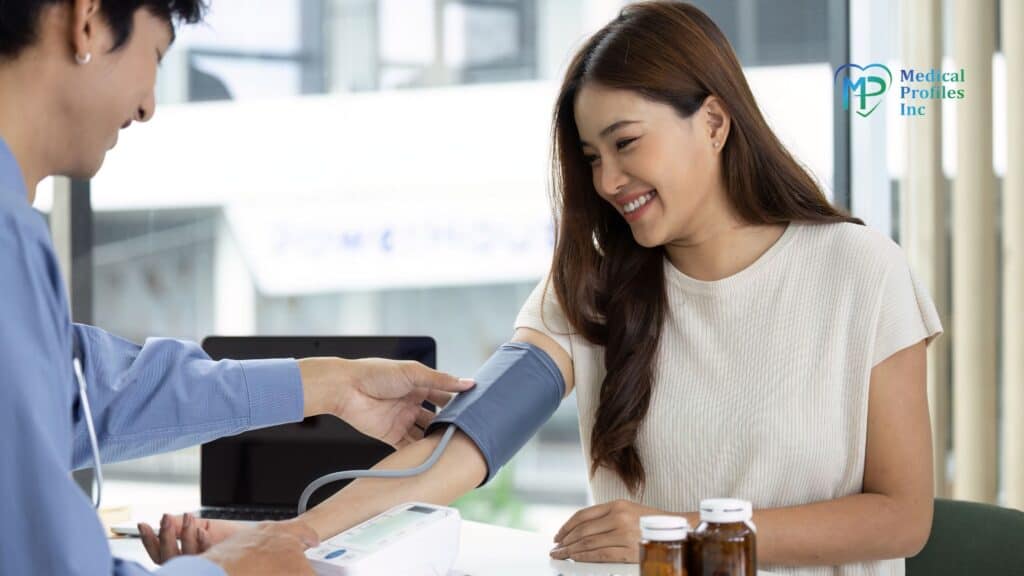 woman getting blood pressure